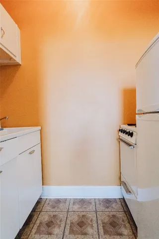 a view of small space with wooden floor