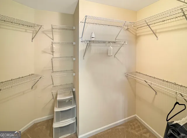 a view of a room with racks on the wall