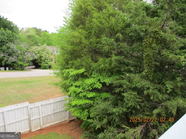 a view of an outdoor space and a yard