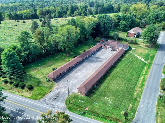a view of a garden with a patio