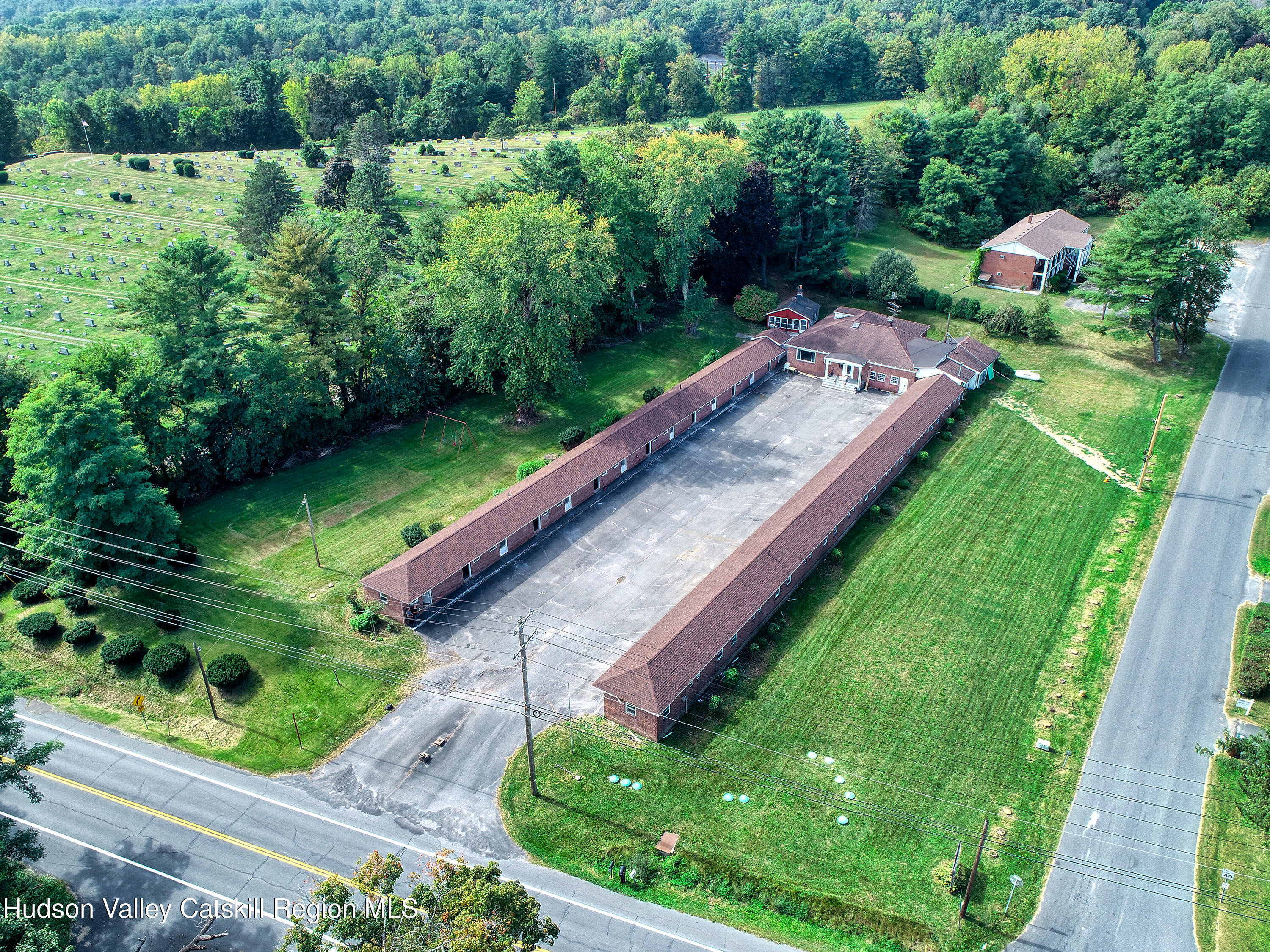 14311 Rte 9W, Unit 2 Ravena, NY 12143 - Photo 11 of 13 a view of a garden with a patio