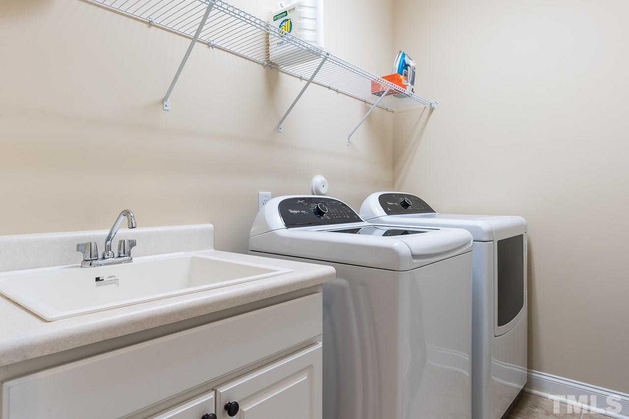 1524 Catch Fly Lane Durham, NC 27713 - Photo 14 of 25 a utility room with dryer and washer
