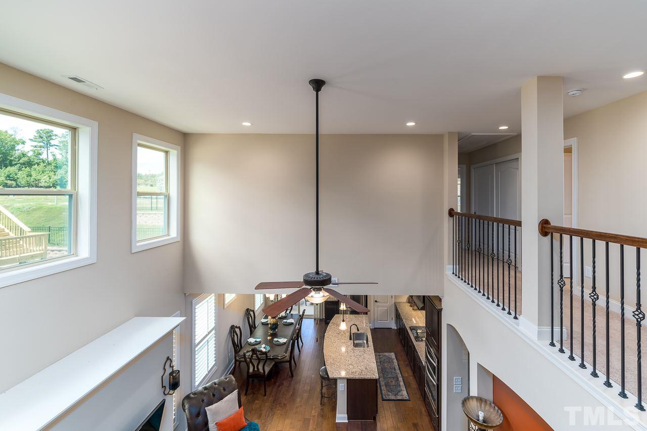 1524 Catch Fly Lane Durham, NC 27713 - Photo 16 of 25 a view of a livingroom with furniture and hardwood floor