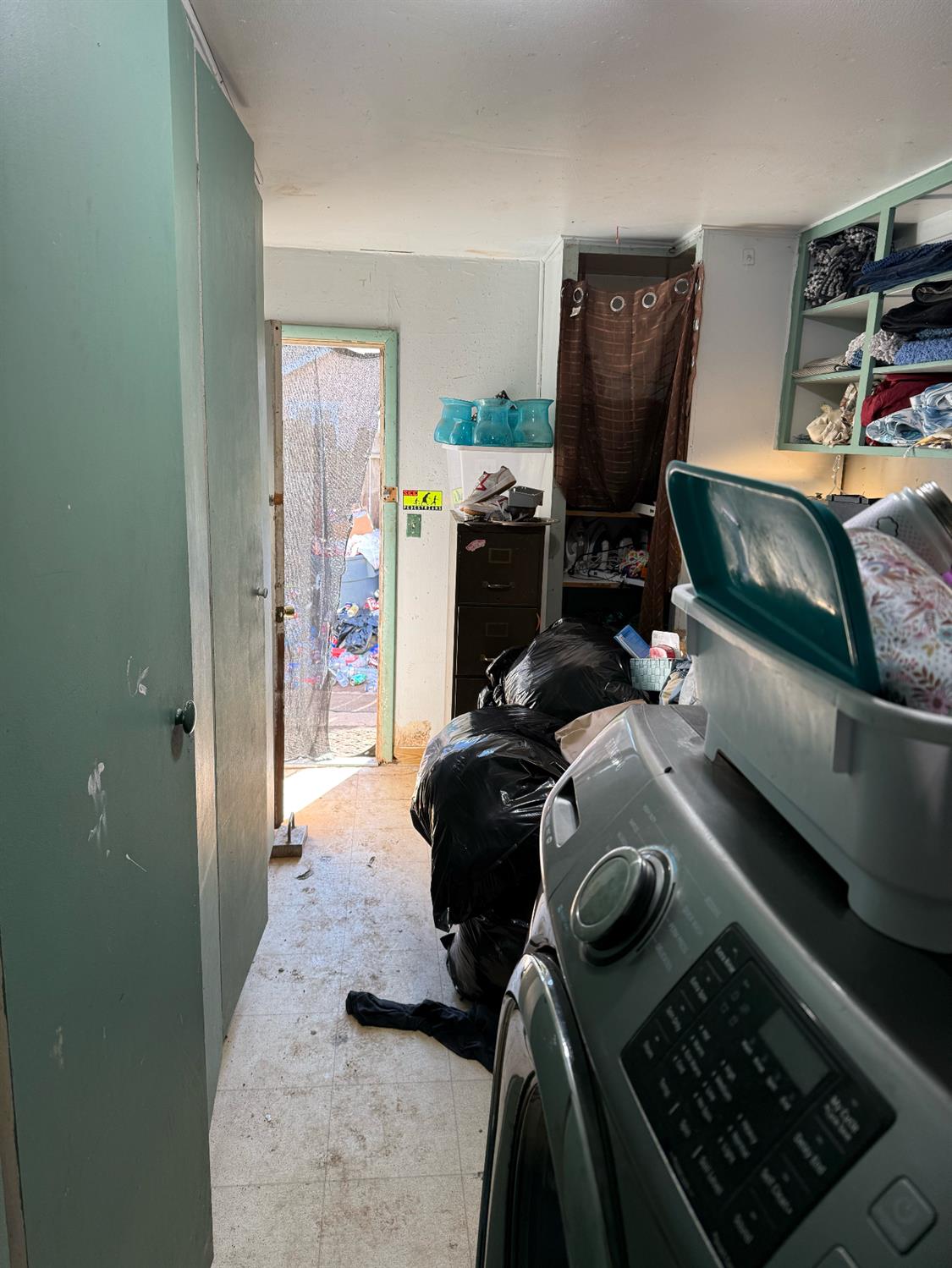 7205 Chesney Way Rio Linda, CA 95673 - Photo 14 of 37 a room with storage and utility