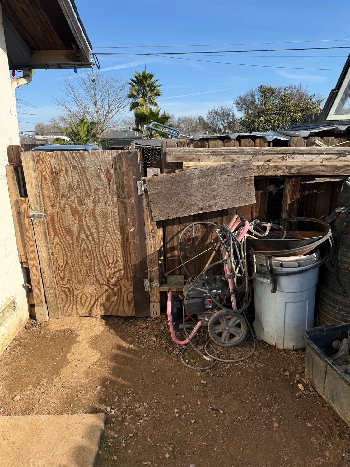 7205 Chesney Way Rio Linda, CA 95673 - Photo 16 of 37 a view of a patio with water heater and a chair