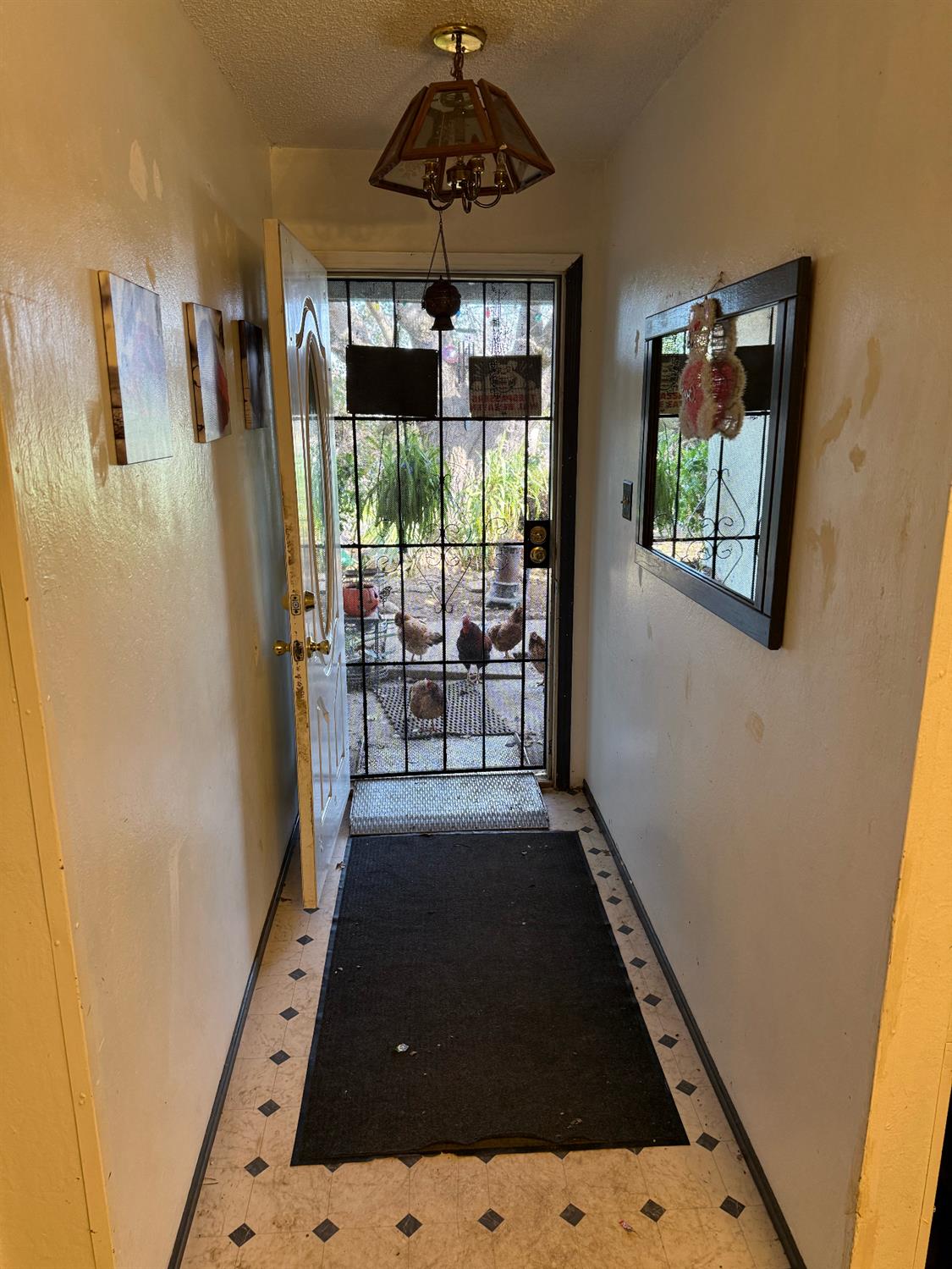 7205 Chesney Way Rio Linda, CA 95673 - Photo 24 of 37 a view of a hallway with furniture and front door