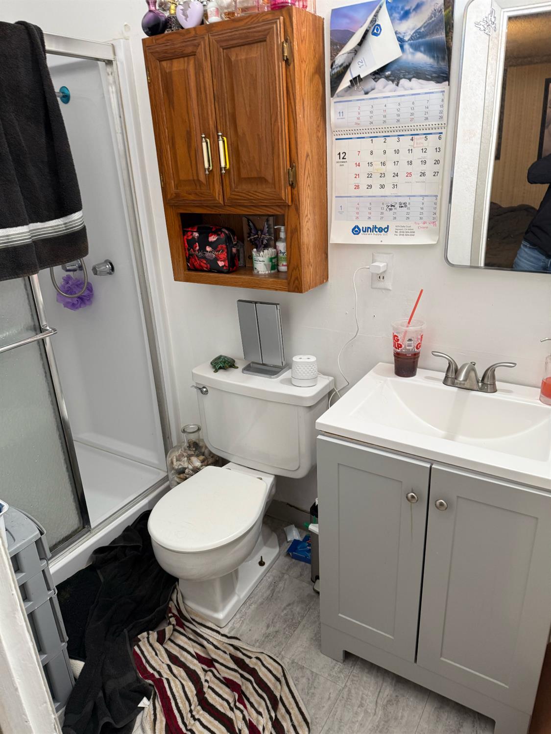 7205 Chesney Way Rio Linda, CA 95673 - Photo 26 of 37 a bathroom with a sink mirror vanity and toilet