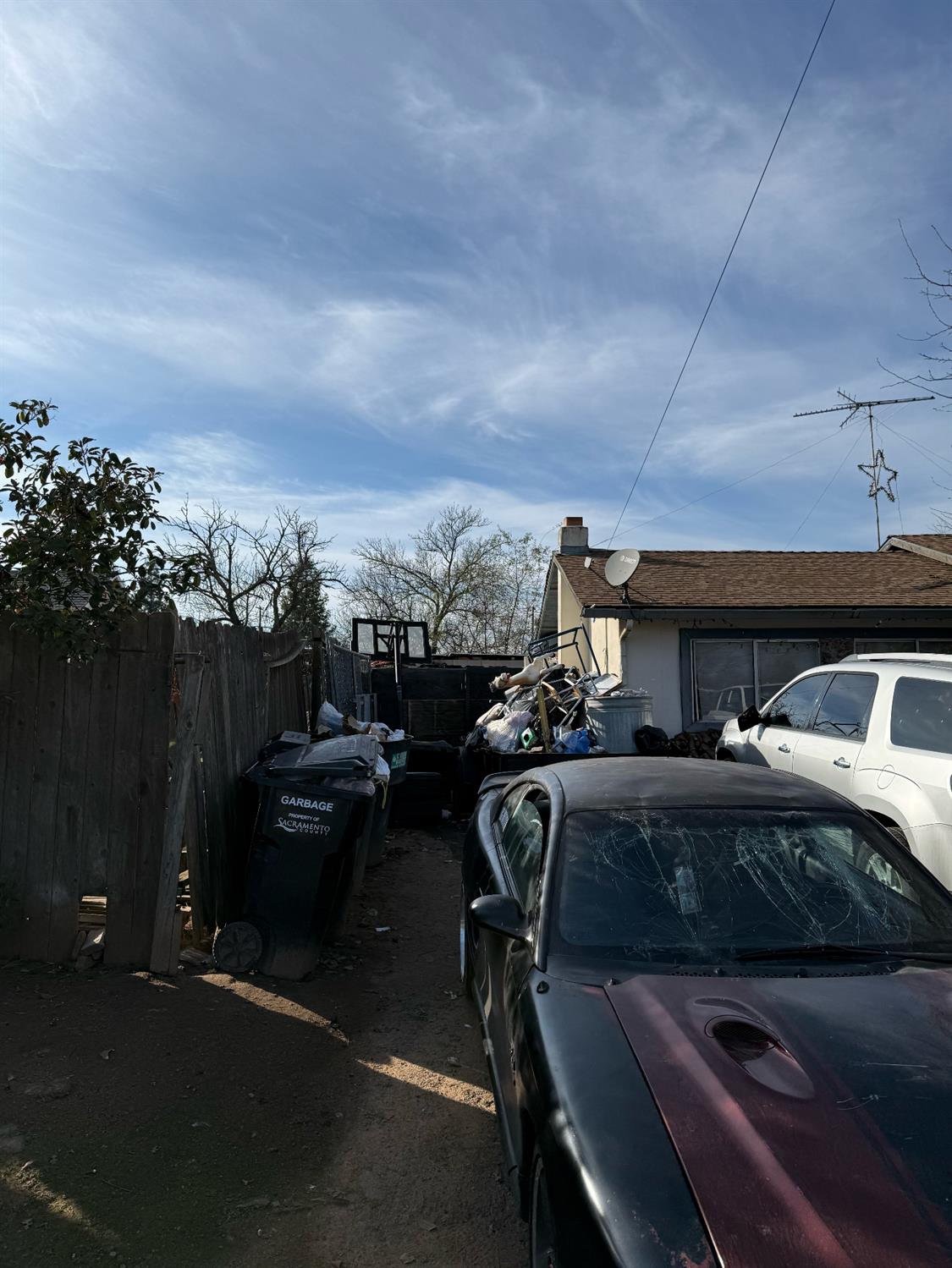 7205 Chesney Way Rio Linda, CA 95673 - Photo 35 of 37 a car parked in front of a house