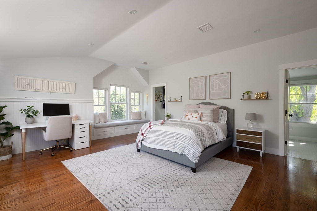 13 Martins Cove Road Hingham, MA 02043 - Photo 11 of 35 a spacious bedroom with a large bed and window