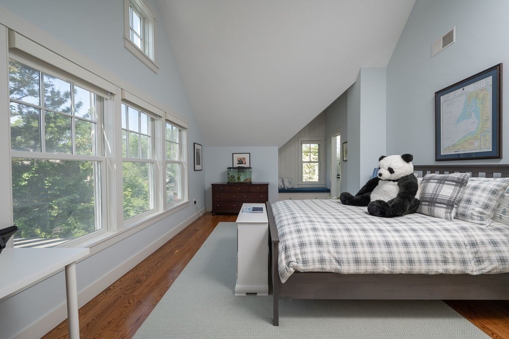 13 Martins Cove Road Hingham, MA 02043 - Photo 15 of 35 a bedroom with bed and large windows