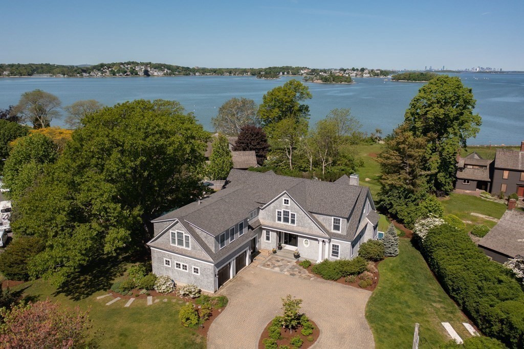 13 Martins Cove Road Hingham, MA 02043 - Photo 3 of 35 an aerial view of a house with outdoor space and lake view