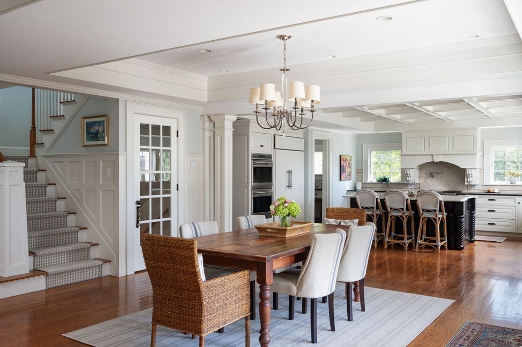 13 Martins Cove Road Hingham, MA 02043 - Photo 6 of 35 a view of a dining room with furniture and wooden floor
