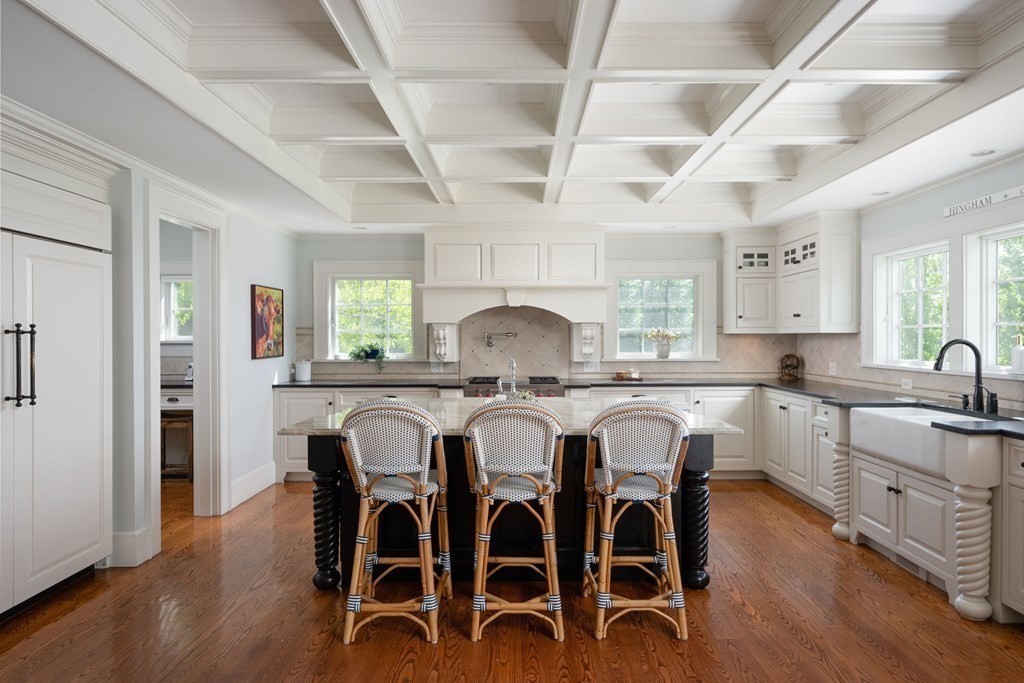 13 Martins Cove Road Hingham, MA 02043 - Photo 7 of 35 a view of a dining room with furniture window and wooden floor