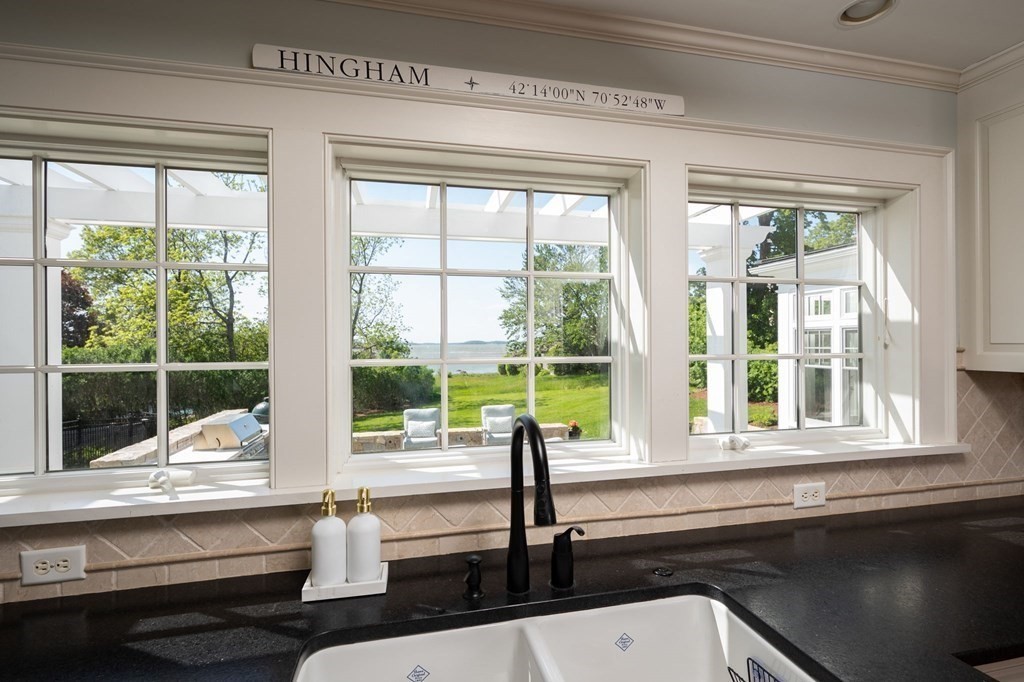 13 Martins Cove Road Hingham, MA 02043 - Photo 8 of 35 a bathroom with a sink and a large window