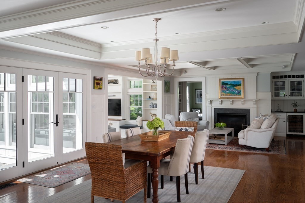 13 Martins Cove Road Hingham, MA 02043 - Photo 9 of 35 a view of a dining room with furniture window and wooden floor