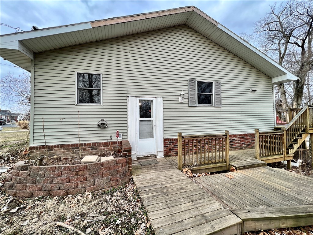23 Lake Grove Club Decatur, IL 62521 - Photo 18 of 21 a view of house with wooden deck and furniture