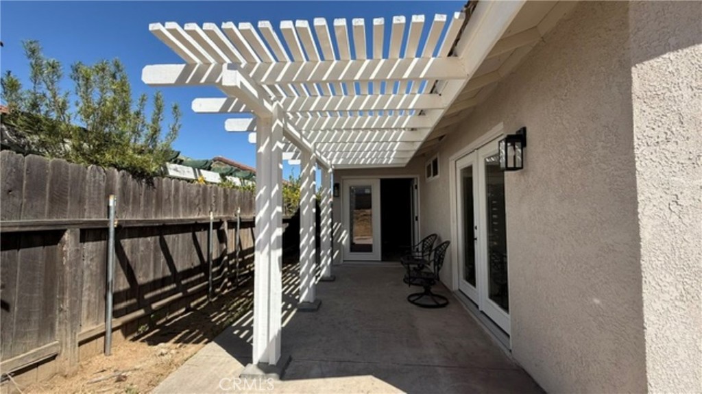 39233 Rising Hill Drive Temecula, CA 92591 - Photo 30 of 34 patio of the kitchen and living room