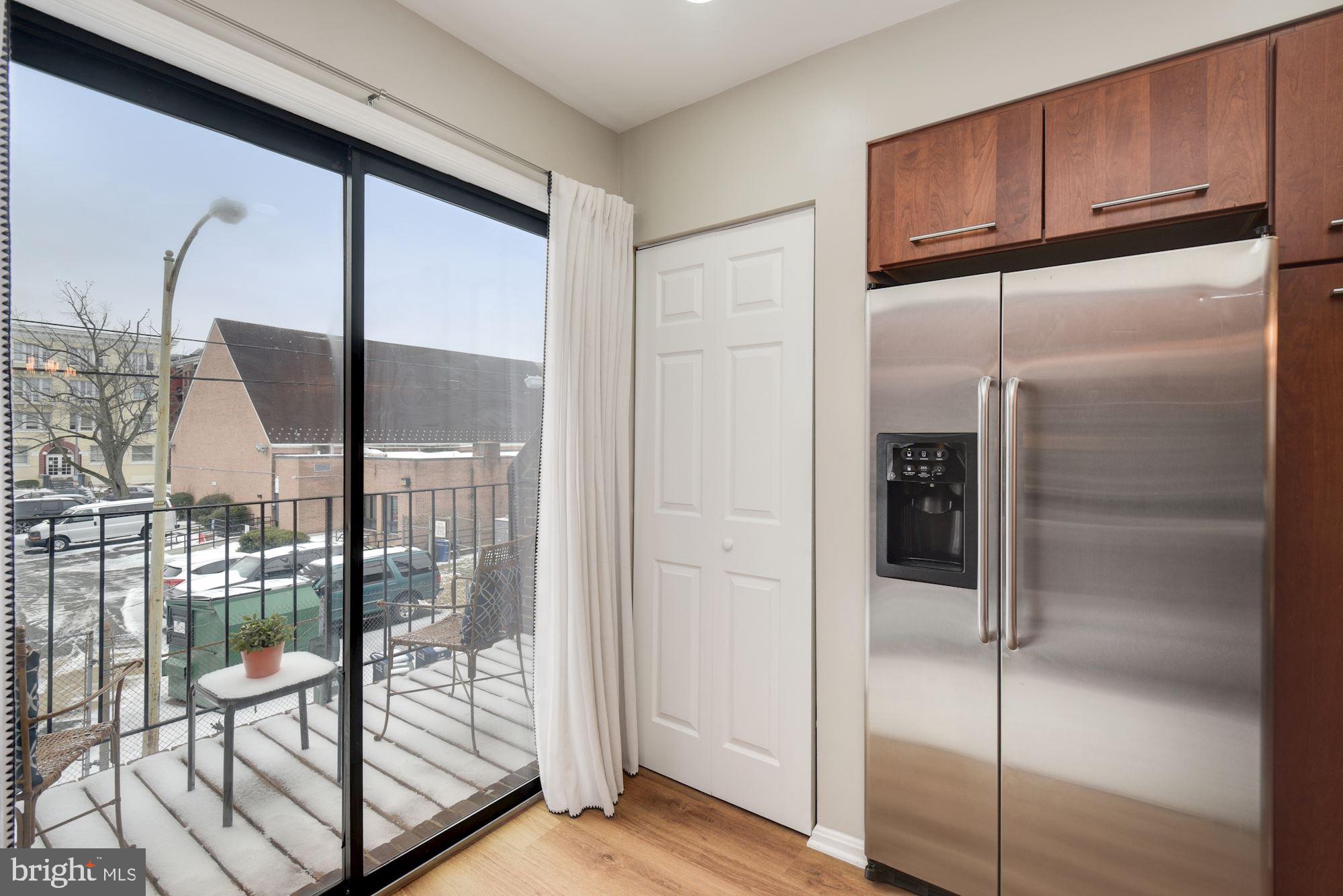 1715 15th Street Northwest, Unit 28 Washington, DC 20009 - Photo 13 of 24 Kitchen opens to private deck!