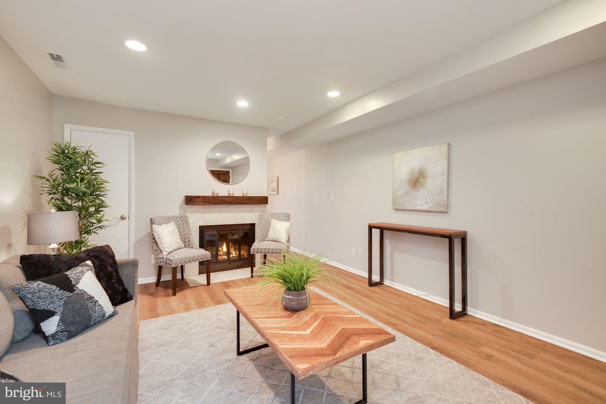 1715 15th Street Northwest, Unit 28 Washington, DC 20009 - Photo 6 of 24 Cozy wood burning fireplace in living room
