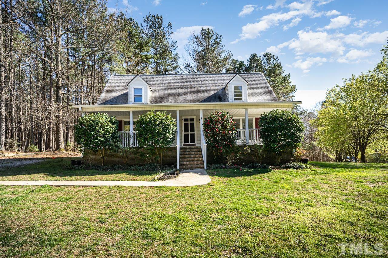 119 Community House Road Henderson, NC 27537 - Photo 1 of 10 a front view of a house with a yard