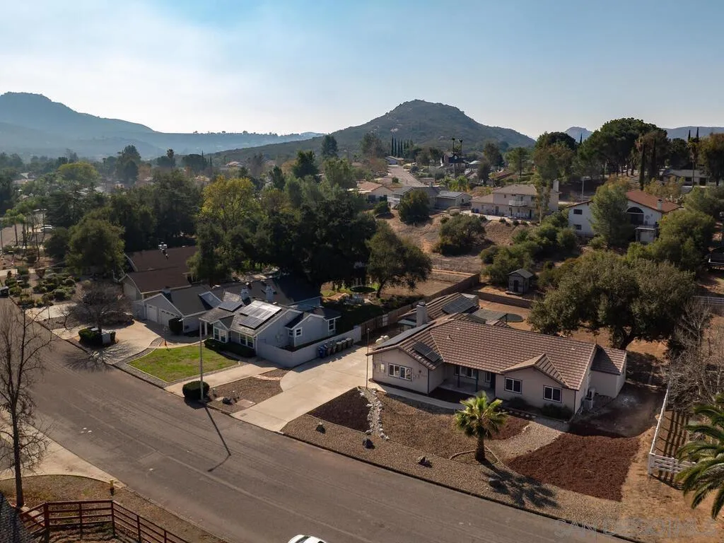 16304 Dartolo Road Ramona, CA 92065 - Photo 33 of 36 an aerial view of a yard and mountain view
