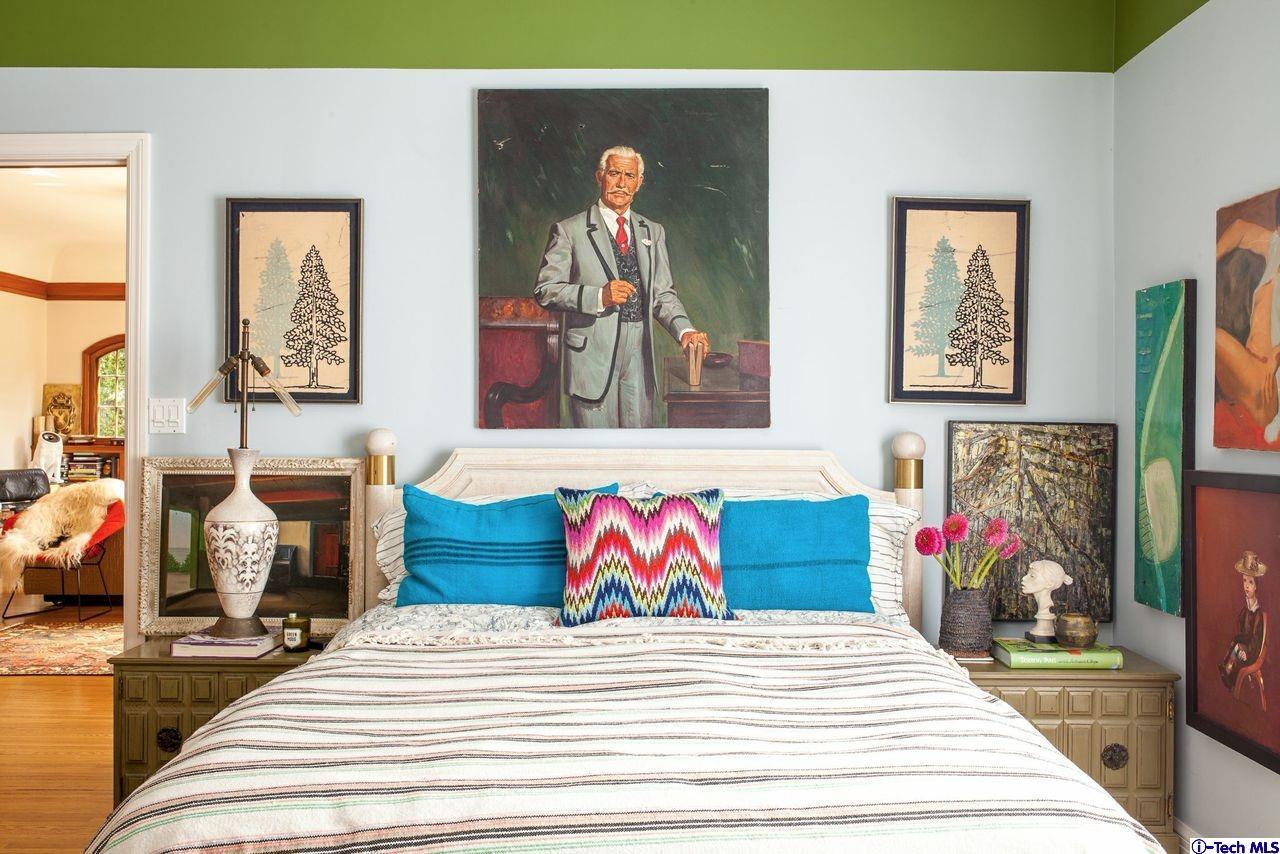 1665 Braeburn Road Altadena, CA 91001 - Photo 12 of 28 a bedroom with a bed and a couch