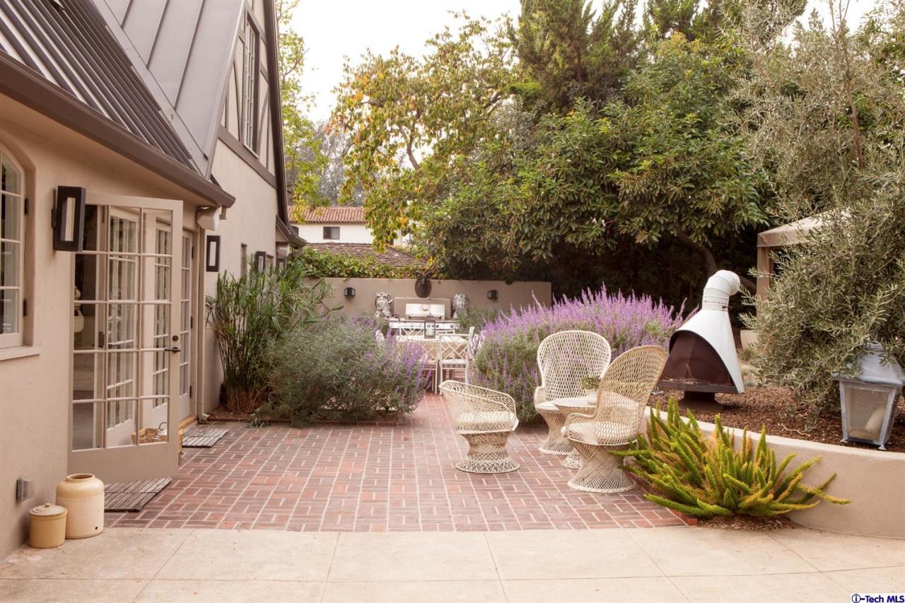 1665 Braeburn Road Altadena, CA 91001 - Photo 26 of 28 a front view of a house with outdoor seating