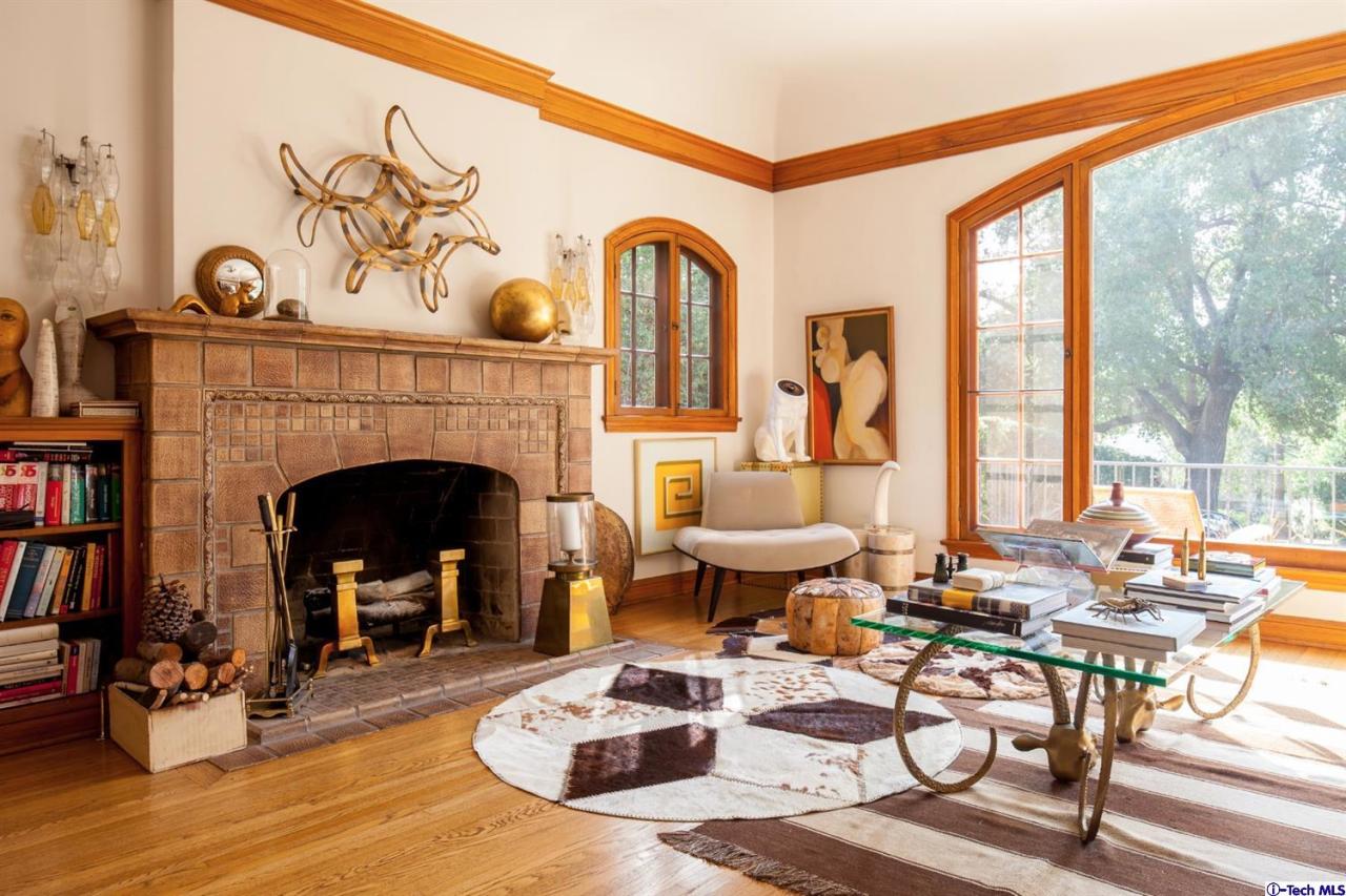 1665 Braeburn Road Altadena, CA 91001 - Photo 4 of 28 a living room with furniture a fireplace and a floor to ceiling window