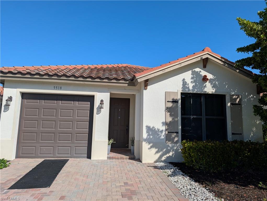 5518 Useppa Drive Ave Maria, FL 34142 - Photo 5 of 9 a front view of a house