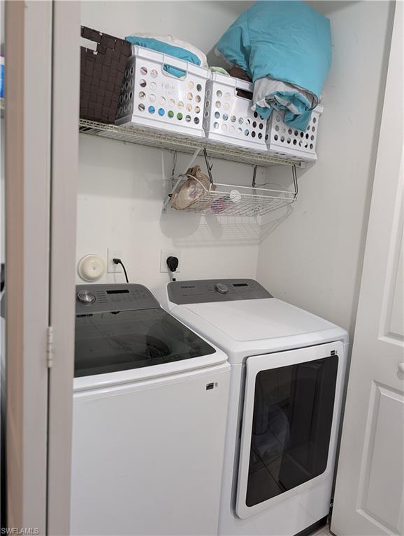 5518 Useppa Drive Ave Maria, FL 34142 - Photo 8 of 9 a utility room with dryer and washer