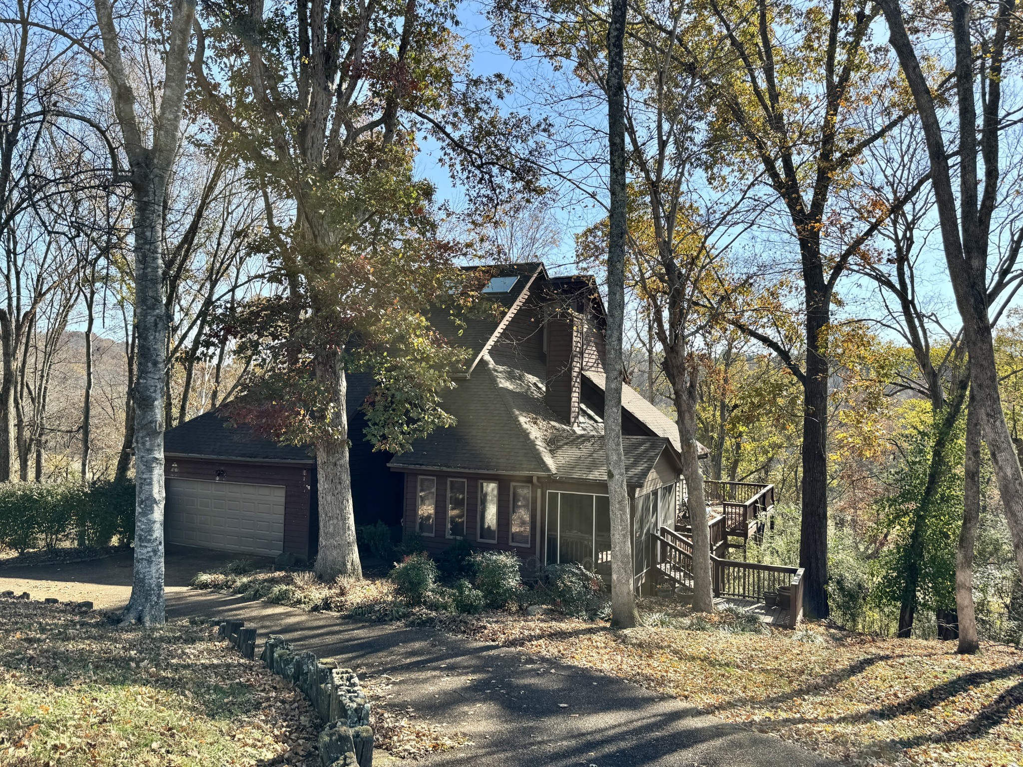 1304 Sycamore Valley Road Ashland City, TN 37015 - Photo 19 of 19 a view of a house with a yard covered in snow