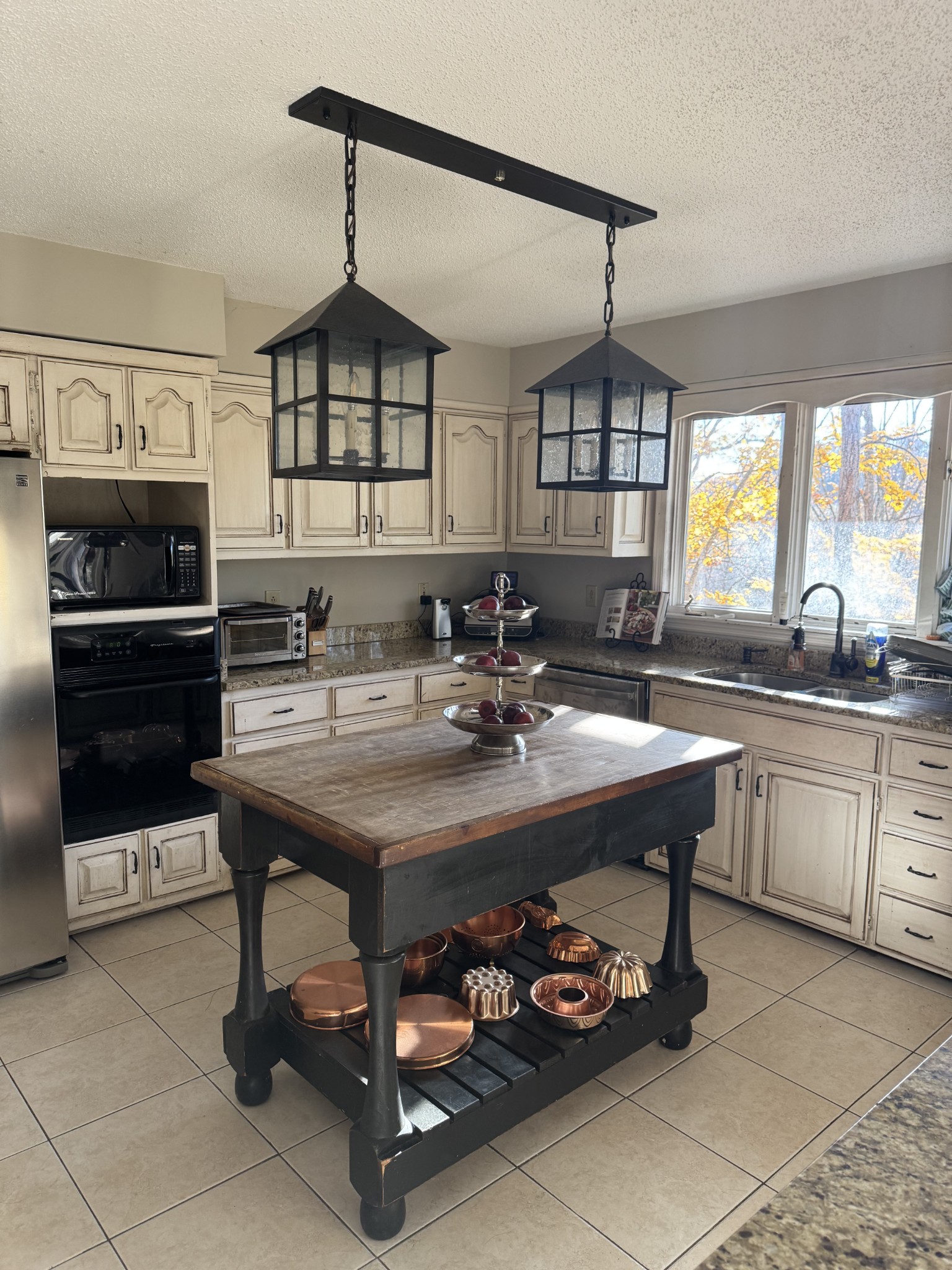 1304 Sycamore Valley Road Ashland City, TN 37015 - Photo 5 of 19 a kitchen with a sink appliances and a chandelier