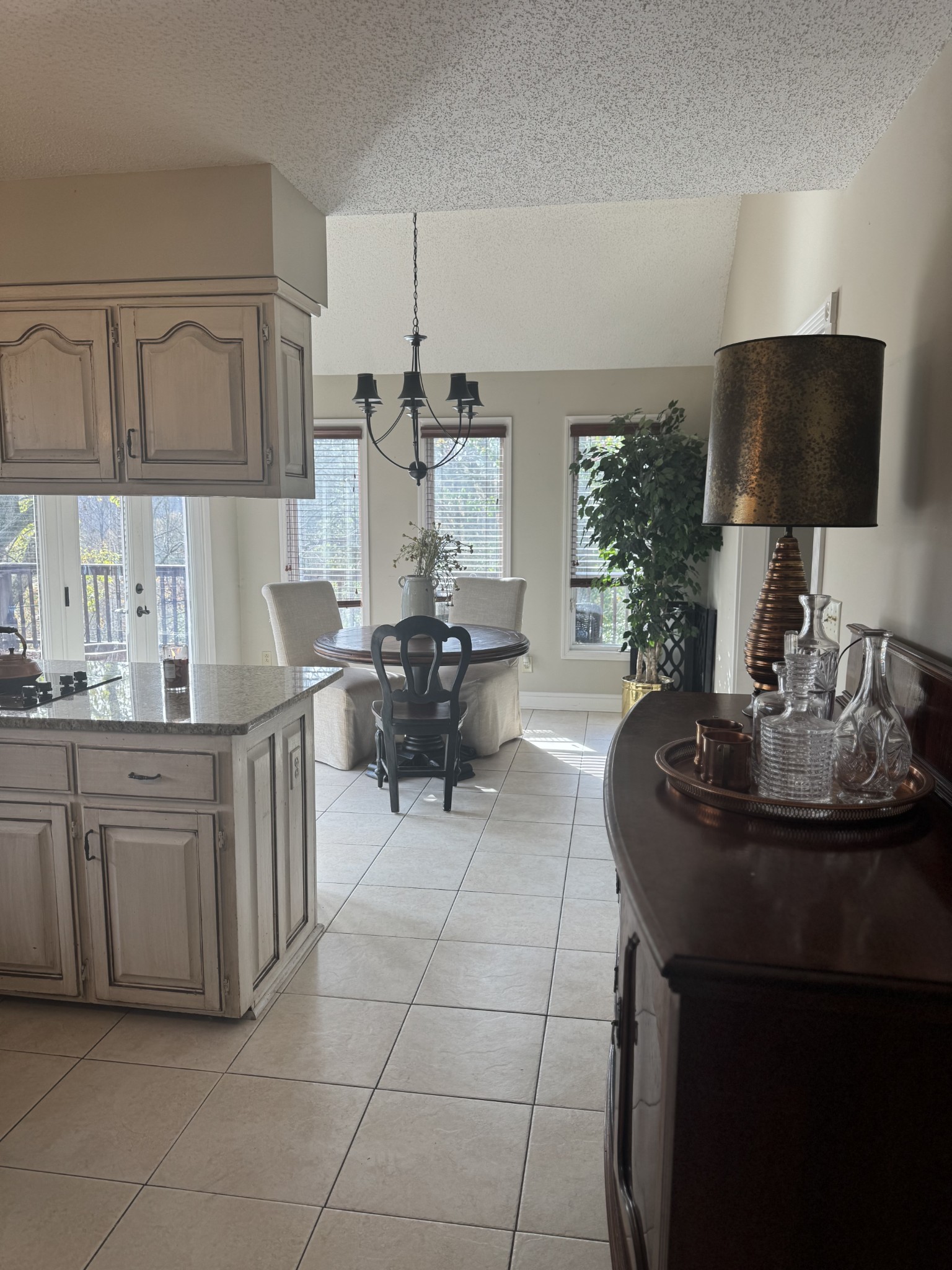1304 Sycamore Valley Road Ashland City, TN 37015 - Photo 7 of 19 a living room with furniture a flat screen tv and kitchen view