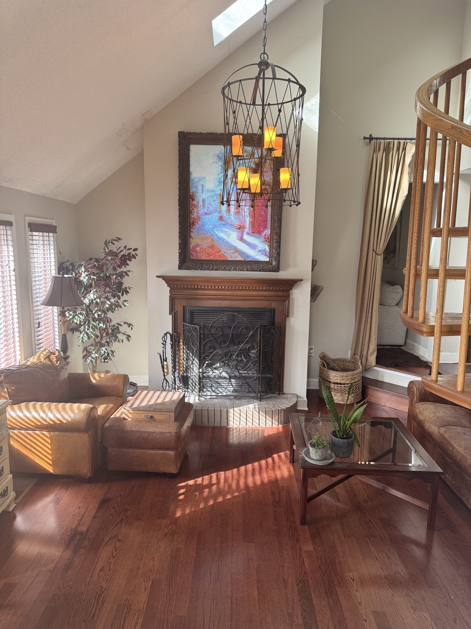 1304 Sycamore Valley Road Ashland City, TN 37015 - Photo 9 of 19 a living room with furniture a fireplace and a chandelier