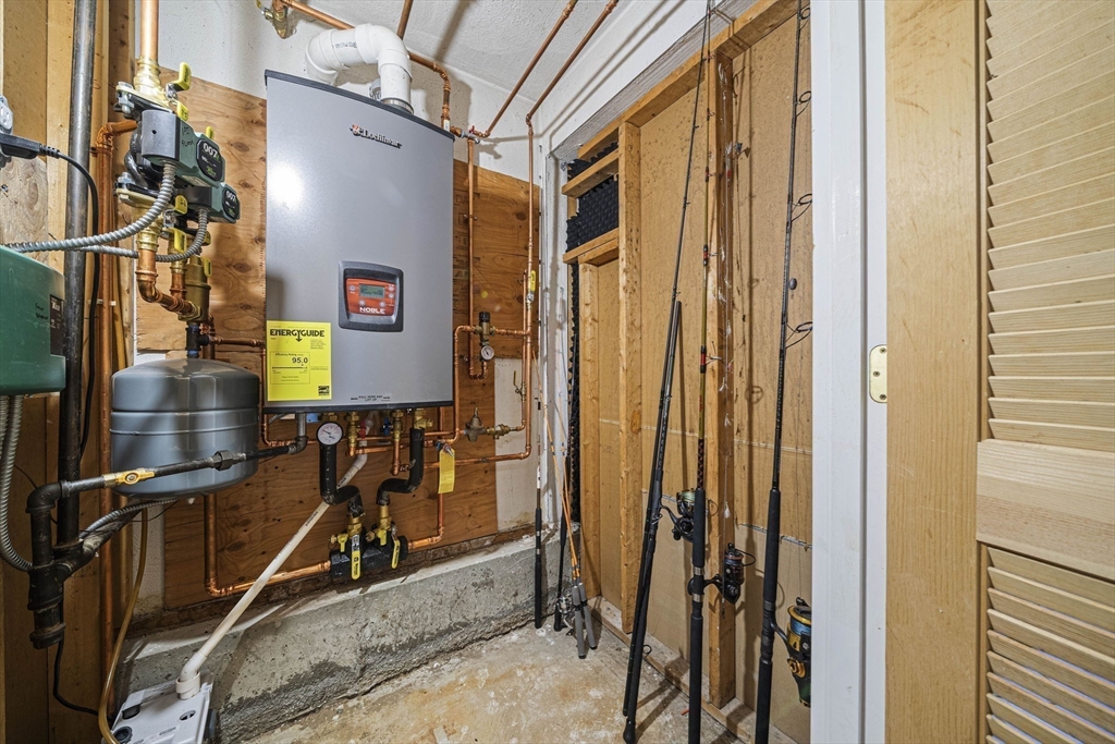 27 Plant Road Waltham, MA 02451 - Photo 21 of 31 a view of a room with gym equipment