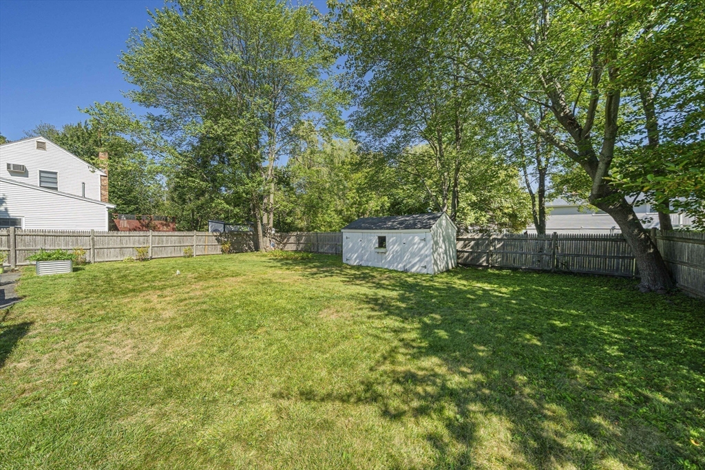 27 Plant Road Waltham, MA 02451 - Photo 24 of 31 a house view with a garden space