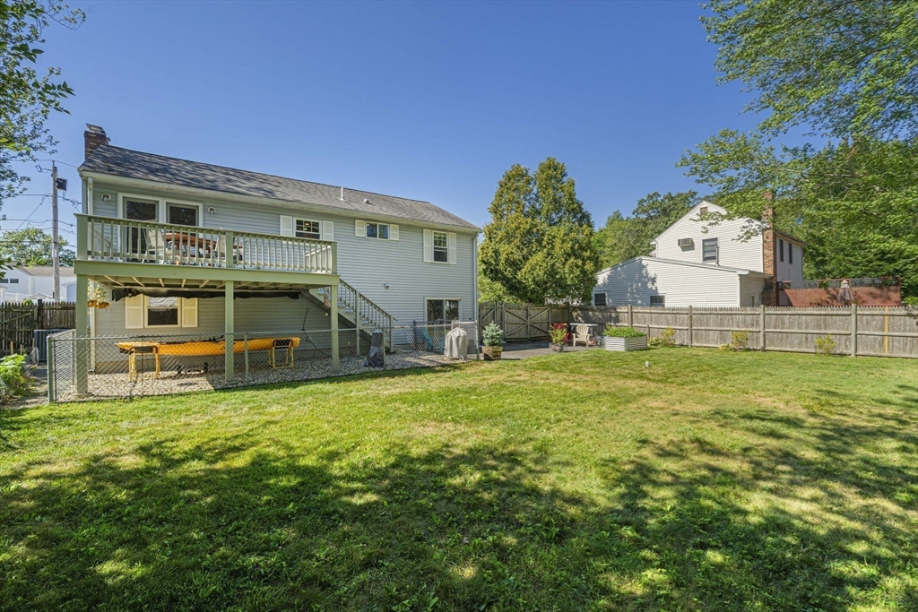 27 Plant Road Waltham, MA 02451 - Photo 25 of 31 a view of a house with a yard
