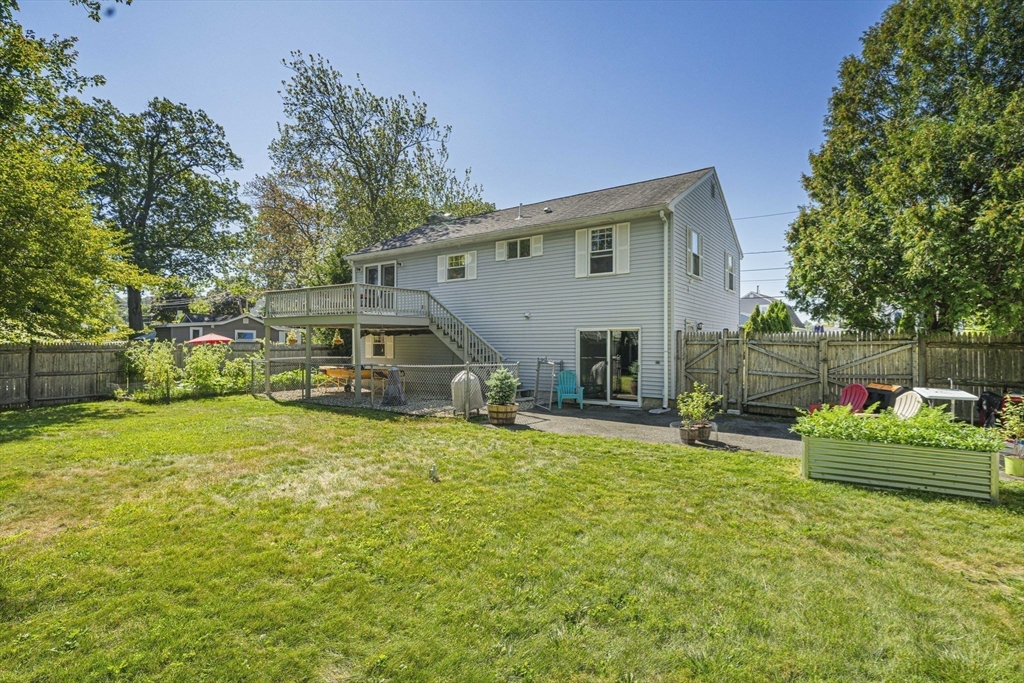 27 Plant Road Waltham, MA 02451 - Photo 26 of 31 a house view with a sitting space and garden
