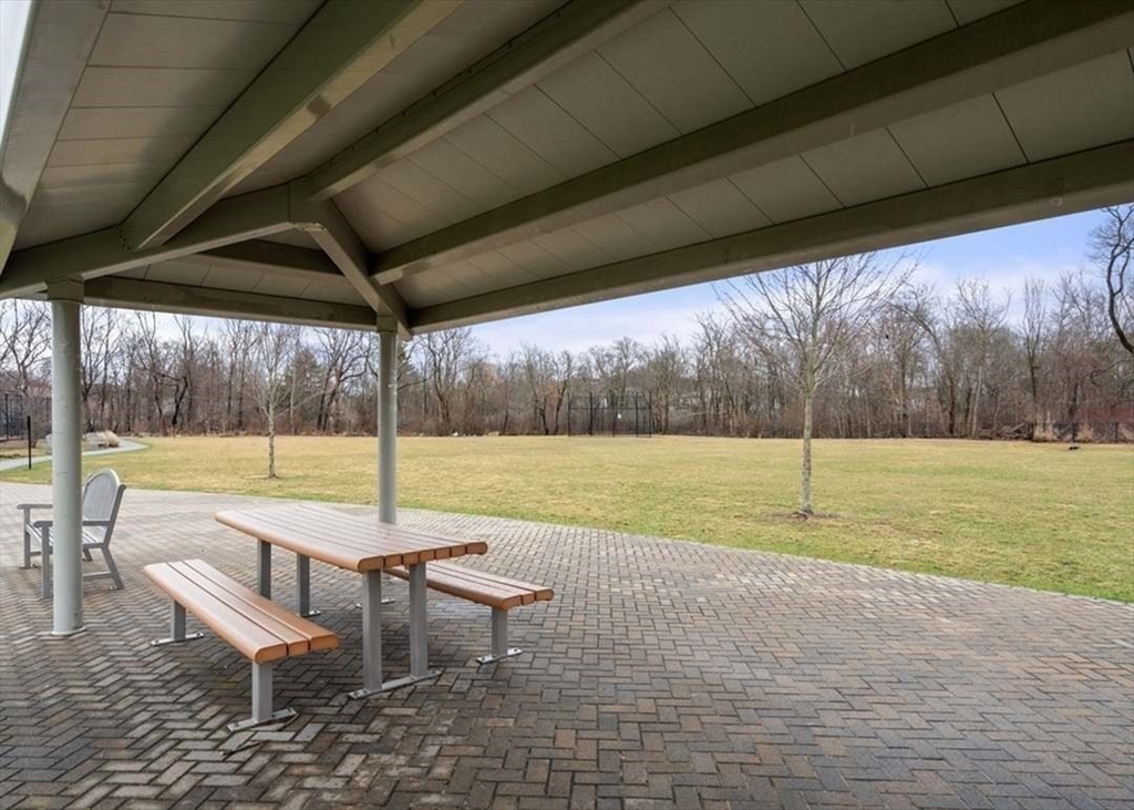 27 Plant Road Waltham, MA 02451 - Photo 29 of 31 a view of swimming pool with outdoor space and seating area