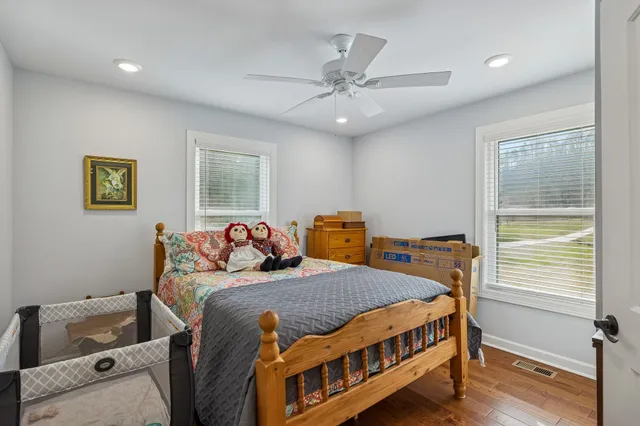 a bathroom with a sink a mirror and a shower