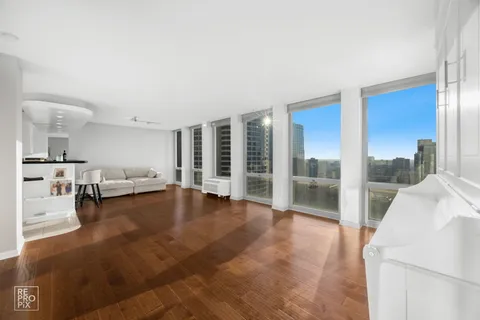 a view of livingroom with furniture and window