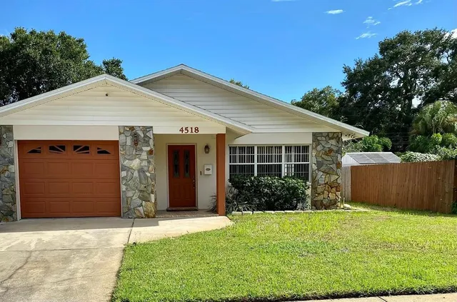 a view of a house with garden