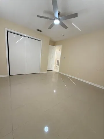 a bathroom with a double vanity sink toilet mirror and bathtub