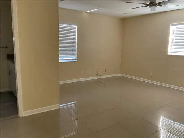 a view of a room that has a window in it