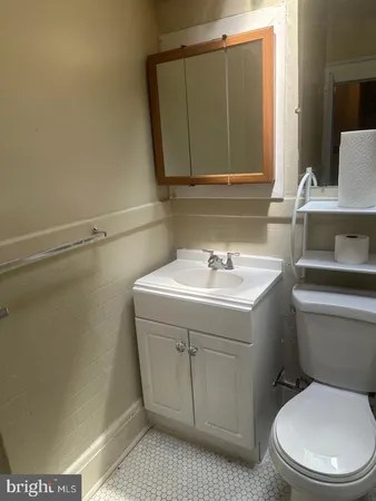 a bathroom with a sink and a toilet