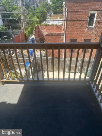 a view of roof deck with patio