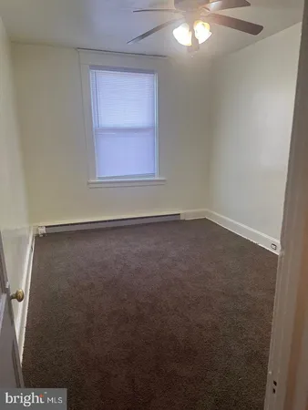 en empty room with windows