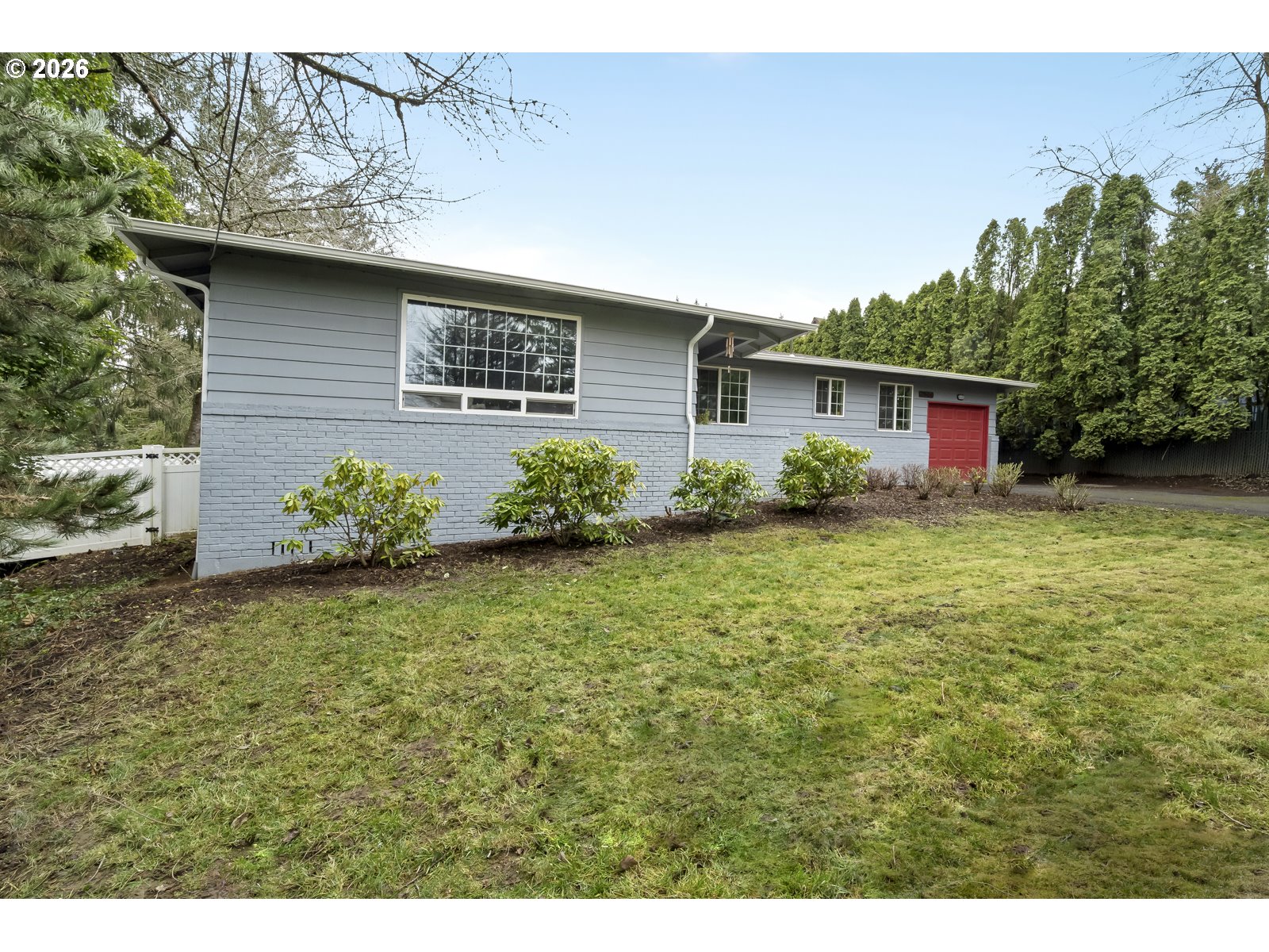 a house view with a garden space