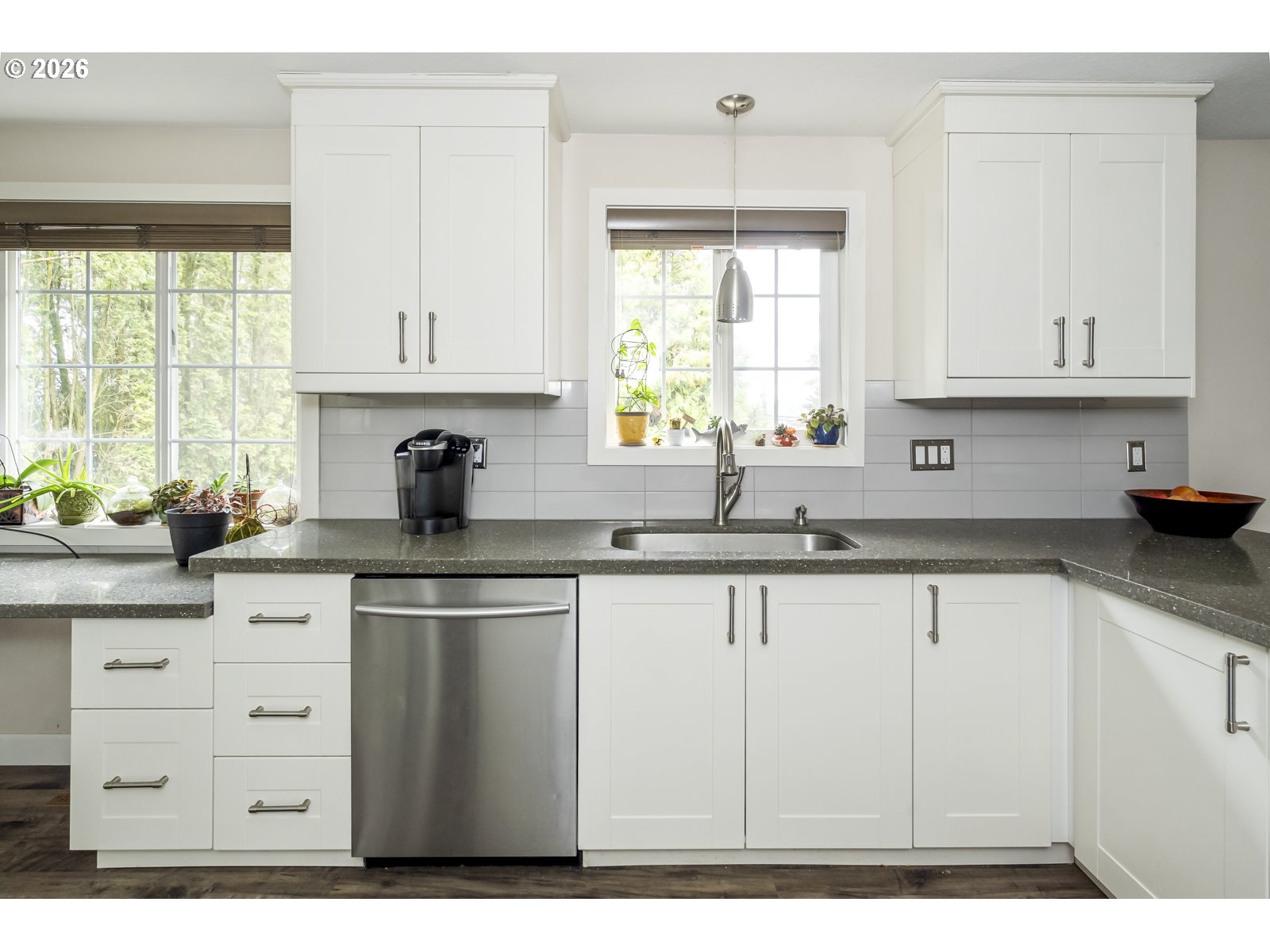 2520 Southwest Towle Avenue Gresham, OR 97080 - Photo 11 of 33 a kitchen with cabinets appliances a sink and a window