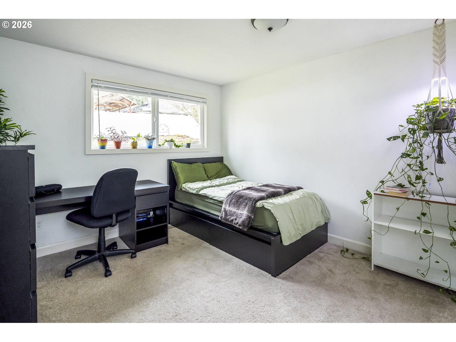 2520 Southwest Towle Avenue Gresham, OR 97080 - Photo 17 of 33 a bedroom with a bed chair and window